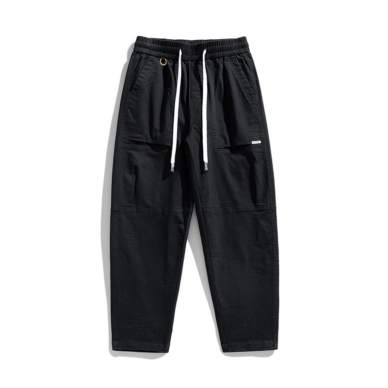 Herren Baggy-Utility-Cargohose im Tapered-Schnitt mit elastischem Tunnelzugbund, aufgesetzten Fronttaschen und Knieabnähern Drune