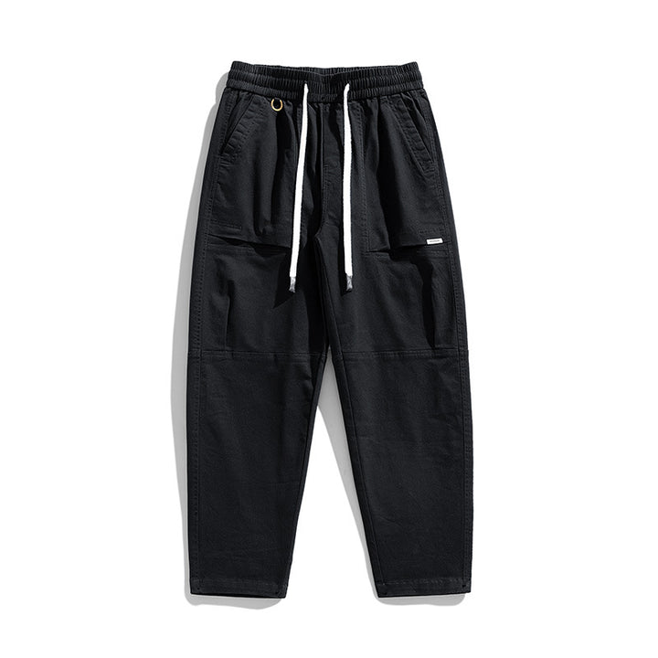 Herren Baggy-Utility-Cargohose im Tapered-Schnitt mit elastischem Tunnelzugbund, aufgesetzten Fronttaschen und Knieabnähern Drune