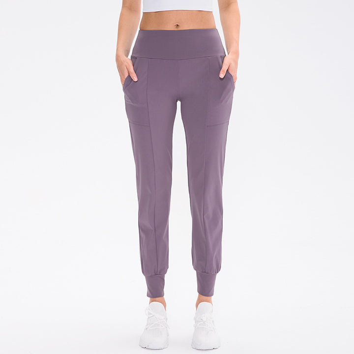 Damen elastische Sporthose mit praktischen Seitentaschen und temperaturregulierendem Material Drune