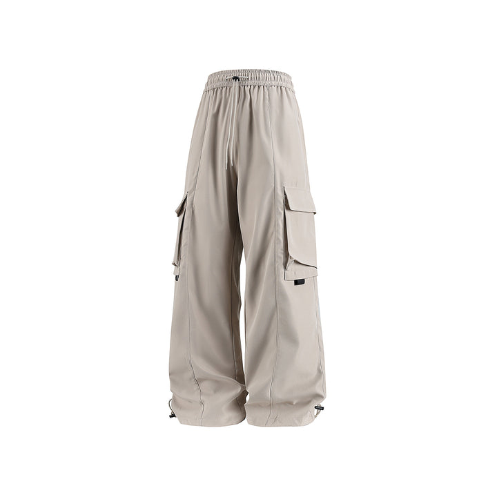 Herren weite Utility‑Cargohose im Baggy‑Cut mit Tunnelzugbund, großen Klappentaschen und verstellbarem Beinabschluss Drune