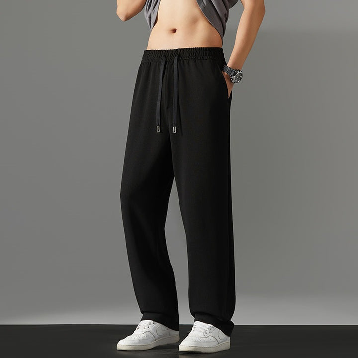 Herren weite Relaxed-Jogginghose aus French-Terry mit Kordelzug, elastischem Bund & geradem Bein Drune