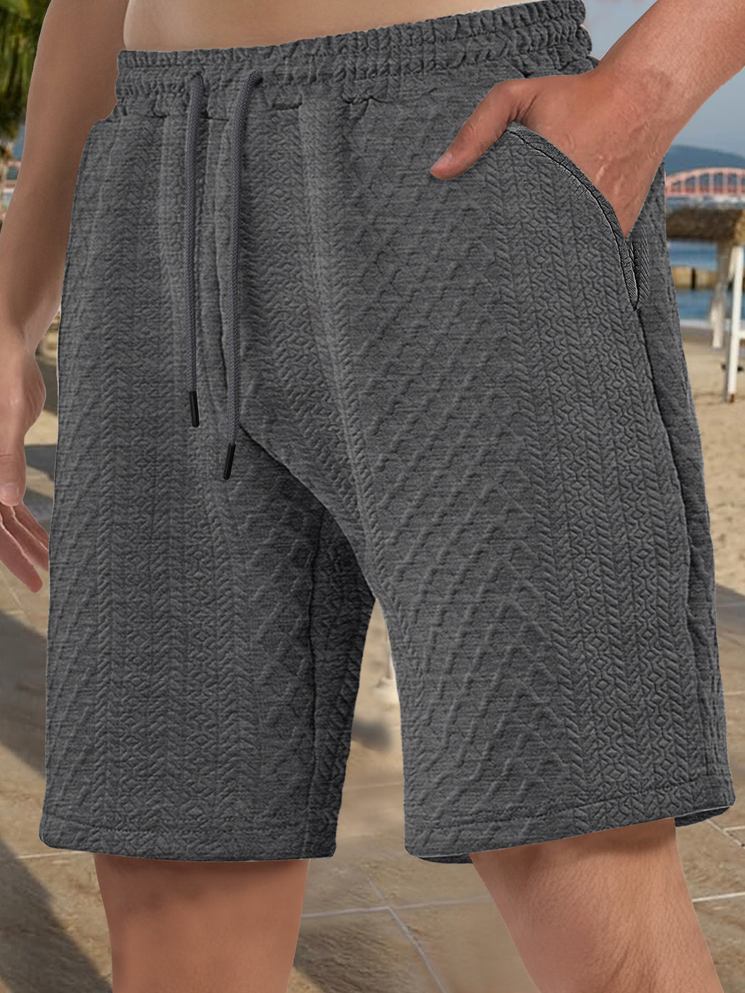Herren nan strukturierte Strand-Bermuda aus Waffeljersey mit elastischem Kordelbund und schrägen Eingrifftaschen Drune