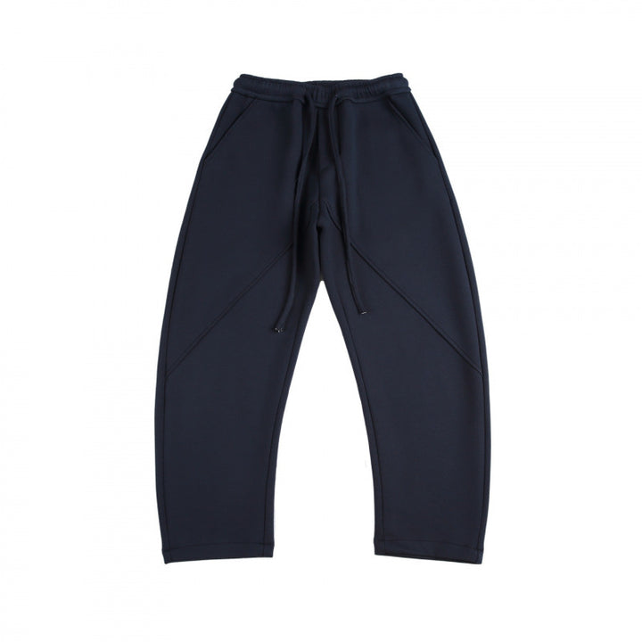 Unisex Weite Tech-Jogginghose mit diagonalem Nahtdesign, Elastikbund und Tunnelzug Drune