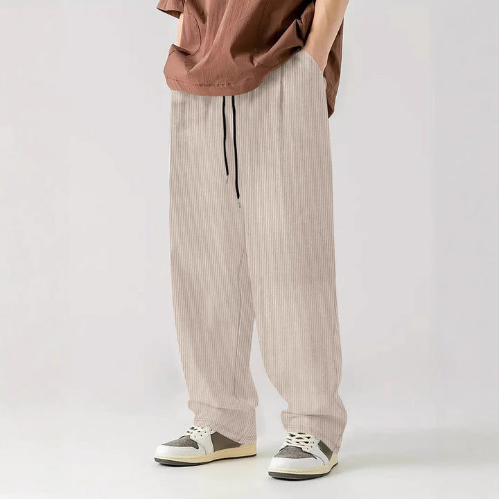 Herren nan weite Relax-Freizeithose aus geripptem Jersey mit Kordelzug, Seitentaschen und weitem Bein Drune