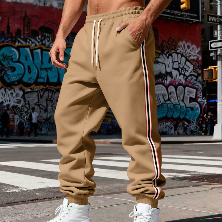 Herren Urbaner Slim-Jogger aus French Terry mit Seitenstreifen und gerippten Bündchen Drune