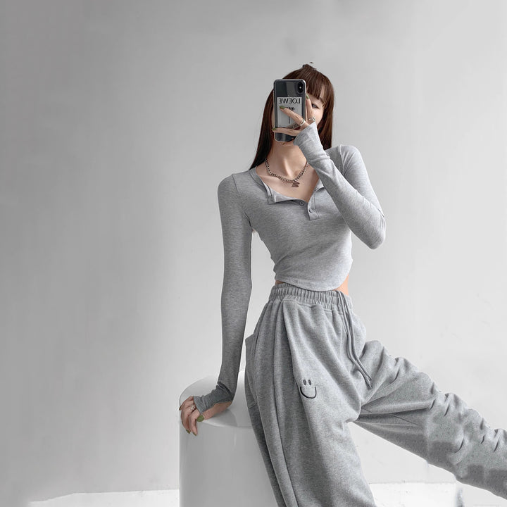 Damen Langarmshirt mit dekorativem Knopfdesign und lässigem Schnitt