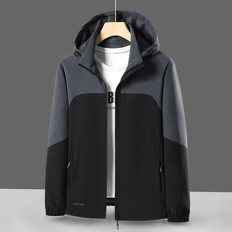 Herren Leichte Softshell-Windjacke mit Kapuze, wasserabweisender Membran und Reißverschlusstaschen Drune