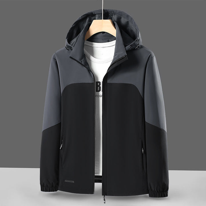 Herren Leichte Softshell-Windjacke mit Kapuze, wasserabweisender Membran und Reißverschlusstaschen Drune