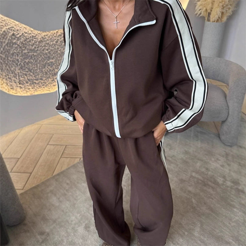 Damen weiches Oversize-Zweiteiler Trainingsset mit Reißverschlussjacke und weiter hochgeschnittener Jogginghose mit Kontraststreifen Drune