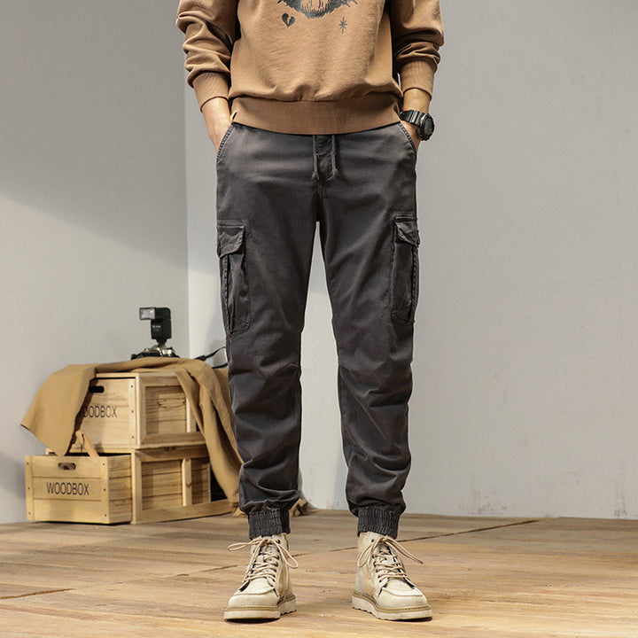 Herren Tapered Cargo-Jogger aus robustem Twill mit Tunnelzugbund, aufgesetzten Klappentaschen und gerippten Knöcheln Drune