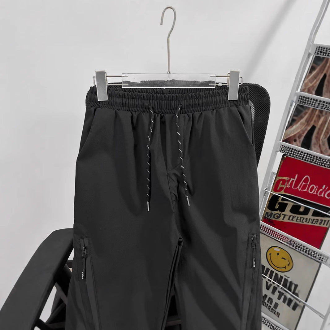 Unisex Sportliche Jogginghose mit verstellbarem Bund und Seitentaschen Drune