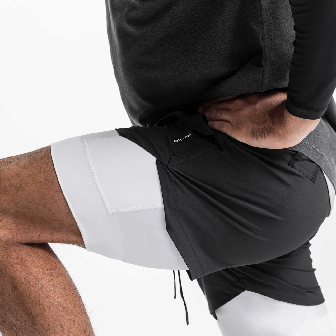 Drune | Doppellagige Shorts mit Tasche