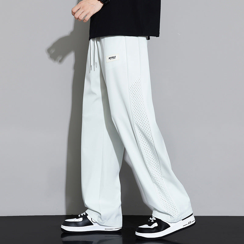 Herren Sportliche Relaxed Fit Jogginghose mit Mesh-Einsätzen