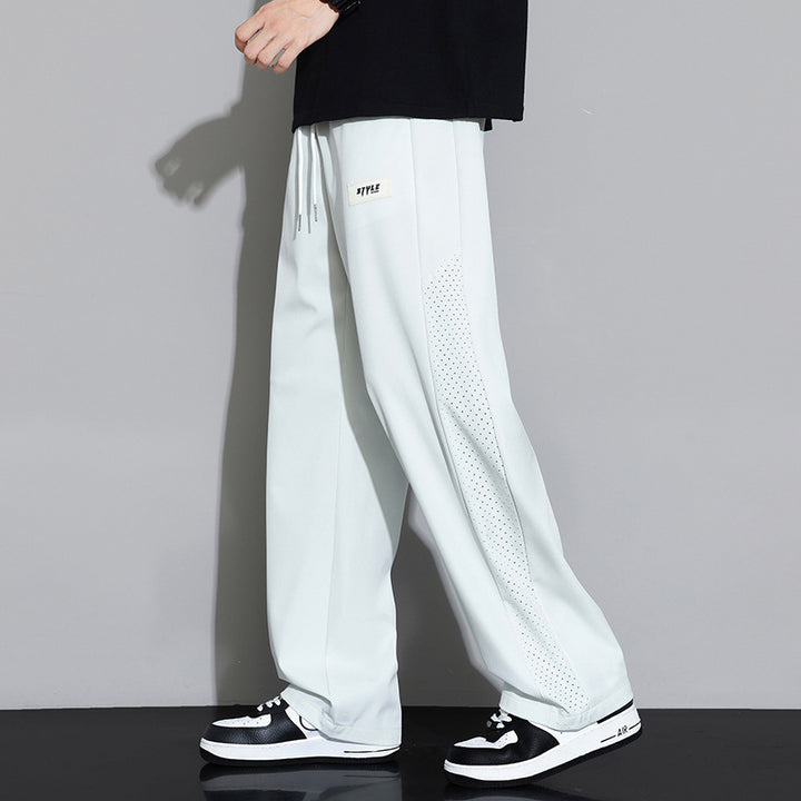 Herren Sportliche Relaxed Fit Jogginghose mit Mesh-Einsätzen