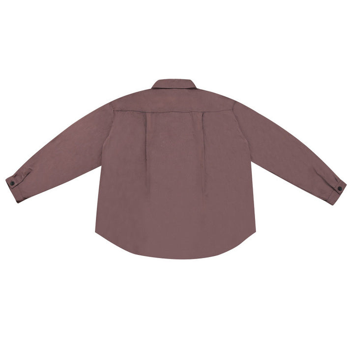 Unisex Weite Hemdjacke im Overshirt‑Cut mit abgerundetem Saum und schrägen Pattentaschen Drune