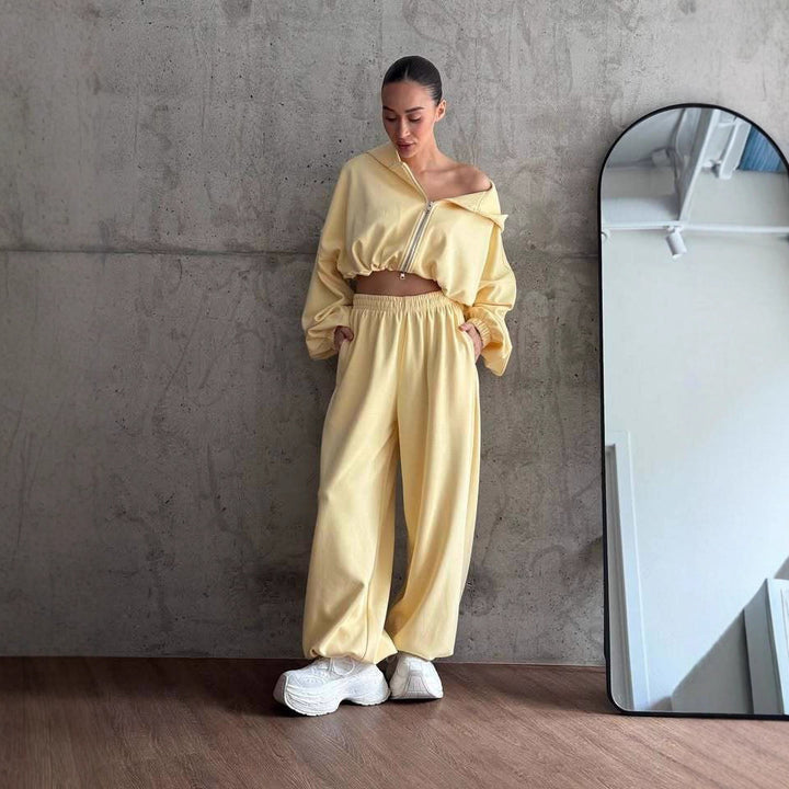 Damen cropped Kapuzen-Zipjacke mit Ballonärmeln und hochgeschnittener weiter Sweatpants-Set Drune