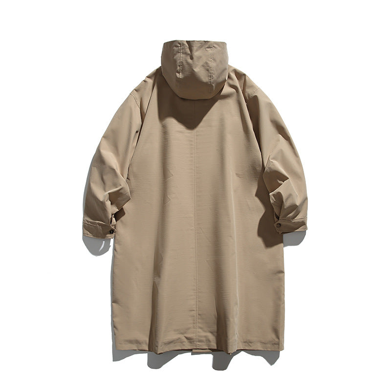 Unisex Langer Kapuzenmantel im Boxy‑Cut mit verdeckter Knopfleiste und großen Pattentaschen Drune