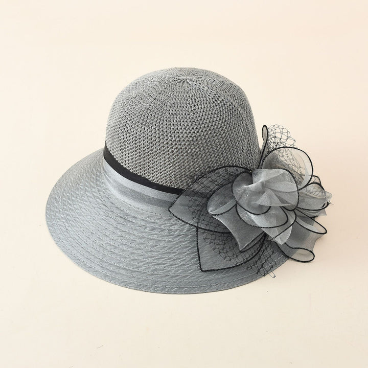 Damen eleganter Sonnenhut mit feiner Schleifenverzierung und breiter Krempe Drune