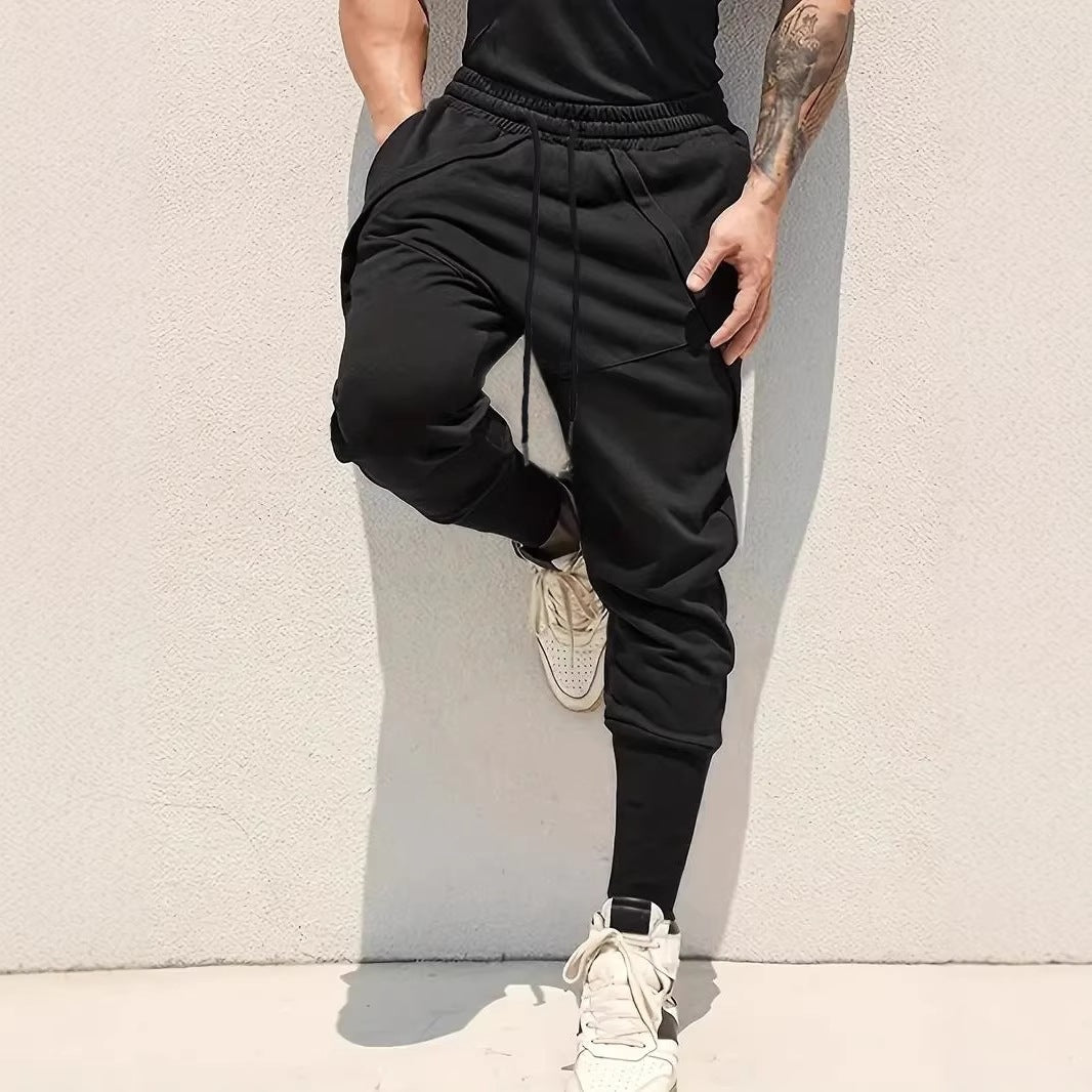 Herren Tapered-Jogginghose mit tiefem Schritt, elastischem Bund & diagonalgesetzten Taschen Drune