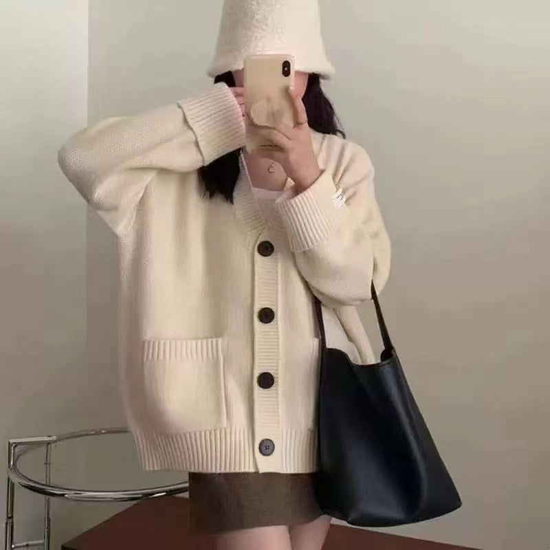 Damen Gemütliche Strickjacke mit tiefem V-Ausschnitt und großen Taschen Drune