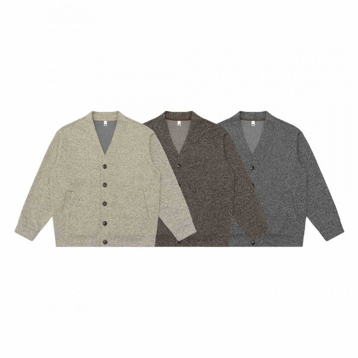 Unisex Oversize-Strickcardigan mit V‑Ausschnitt, durchgehender Knopfleiste und aufgesetzten Eingrifftaschen Drune