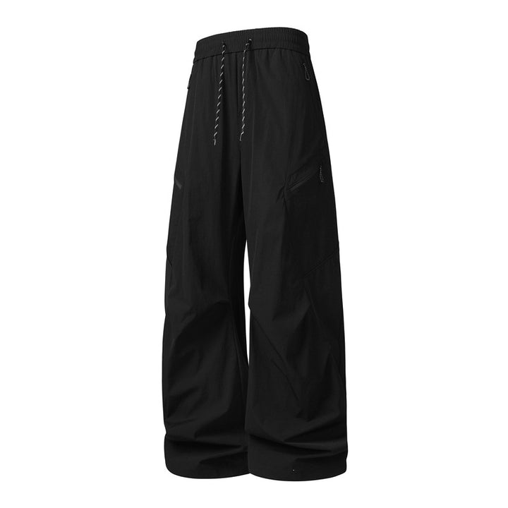 Herren Oversize-Utility-Cargo-Hose aus leichtem Nylon mit elastischem Kordbund, seitlichen Reißverschlusstaschen & weiter Ballon-Silhouette Drune