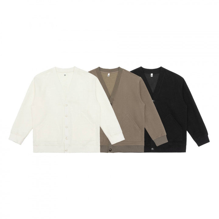 Unisex Oversize Waffelstrick-Cardigan mit V-Ausschnitt, Knopfleiste und aufgesetzten Taschen Drune
