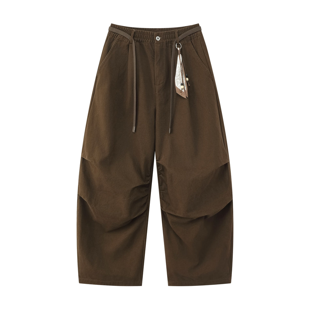 Damen Weite Culotte‑Hose mit Elastikbund, Stufenfalten und dekorativem Tuchanhänger Drune