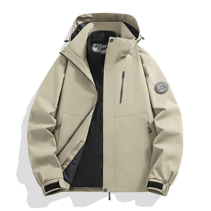 Herren Softshell-Performancejacke mit abnehmbarer Kapuze, verdecktem durchgehendem Reißverschluss und ergonomischem Schnitt Drune