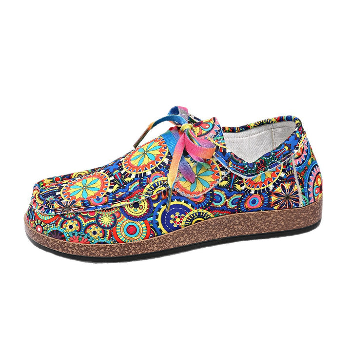 Damen Bequeme Plateau-Slipper im Ethno‑Print mit Korkoptik‑Sohle Drune