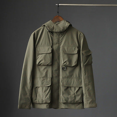 Herren urbane Feldjacke mit Mehrfach‑Taschen, windabweisender Oberfläche und verdeckter Kapuze Drune