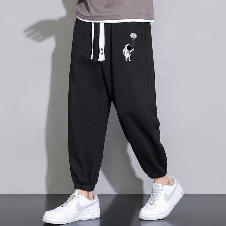 Herren Lockere Jogginghose mit Astronauten-Print, Kordelzugbund und elastischen Saumbündchen Drune
