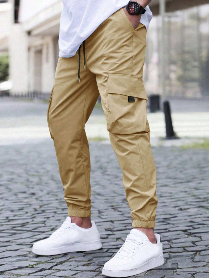 Herren technische Travel-Joggerhose mit integriertem Sicherheitsfach elastischem Tunnelzugbund und wasserabweisender Beschichtung Drune