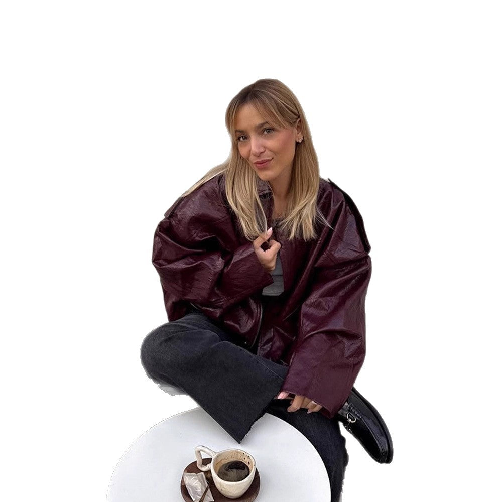 Damen Kurzblouson in glänzender Lackoptik mit Boxy‑Silhouette und überschnittenen Schultern Drune
