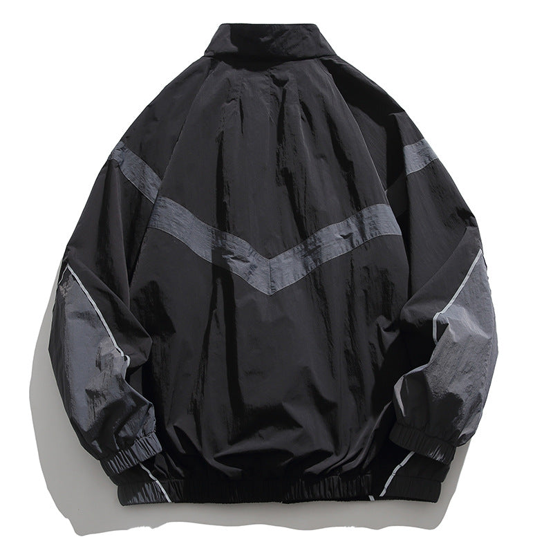 [Unisex] Oversize technische Wind- und Regenjacke mit Stehkragen, reflektierenden Paspeln und elastischem Saum Drune