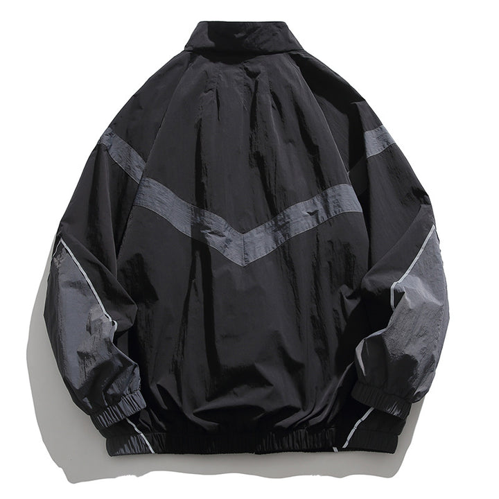 [Unisex] Oversize technische Wind- und Regenjacke mit Stehkragen, reflektierenden Paspeln und elastischem Saum Drune