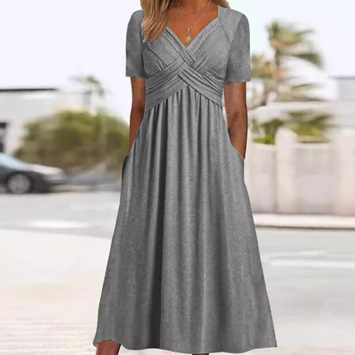 Damen nan luftiges Midikleid mit V-Ausschnitt Wickeloptik Empire-Taille und Taschen Drune