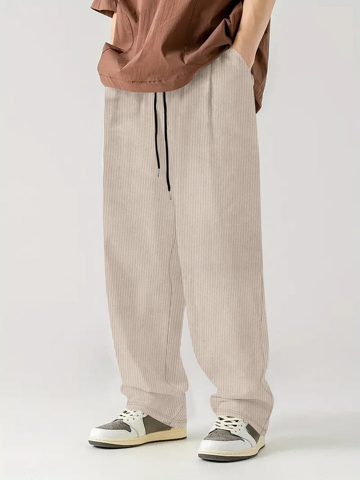Herren nan weite Relax-Freizeithose aus geripptem Jersey mit Kordelzug, Seitentaschen und weitem Bein Drune