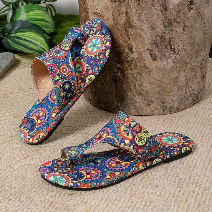 Damen Zehenstegsandalen mit buntem Blumenmuster und rutschfester Sohle Drune