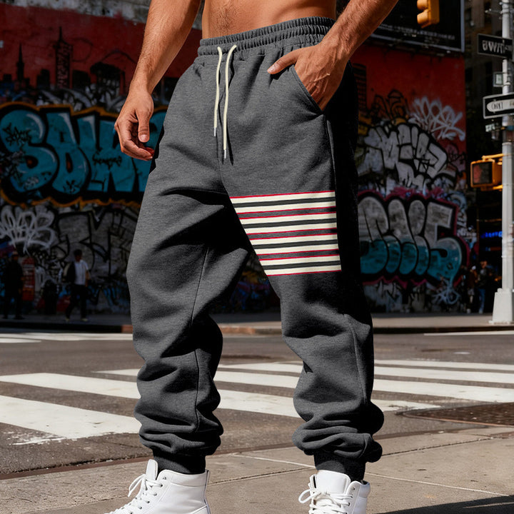 Herren Relaxed-Fit Jogginghose mit seitlicher Streifenapplikation, Kordelzug & gerippten Bündchen Drune