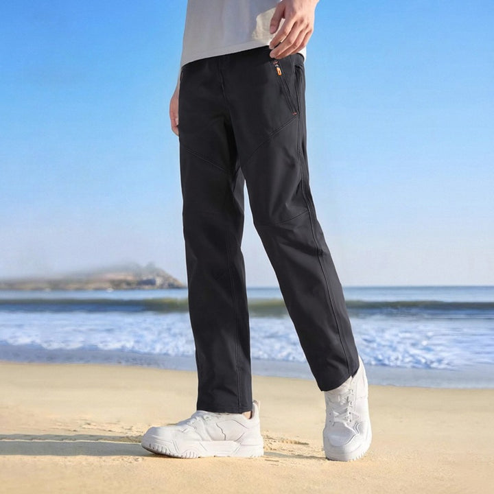 Herren Wasserabweisende Tech‑Cargo‑Hose mit Tunnelzugbund & Mehrfachtaschen Drune
