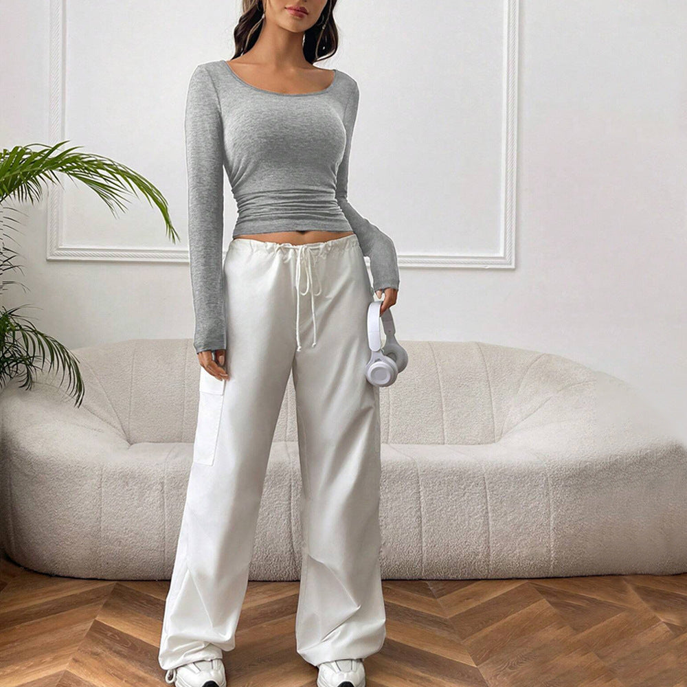 Damen cropped Langarmshirt mit figurbetonter Silhouette und modischen Raffungselementen Drune