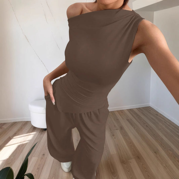 Damen stylischer Jumpsuit mit asymmetrischem Design und Taschen Drune