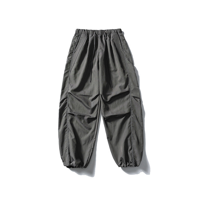 [Herren] weit geschnittene Nylon-Joggerhose im Utility-Stil mit Tunnelzugbund, Kontrastpaspel und elastischen Knöchelabschlüssen Drune
