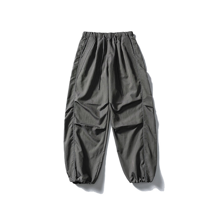 [Herren] weit geschnittene Nylon-Joggerhose im Utility-Stil mit Tunnelzugbund, Kontrastpaspel und elastischen Knöchelabschlüssen Drune