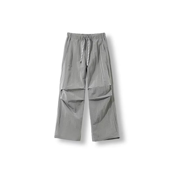 Herren Locker geschnittene Nylon-Trackpants mit Kordelzug, aufgesetzten Taschen und gerader Wide‑Leg-Passform Drune