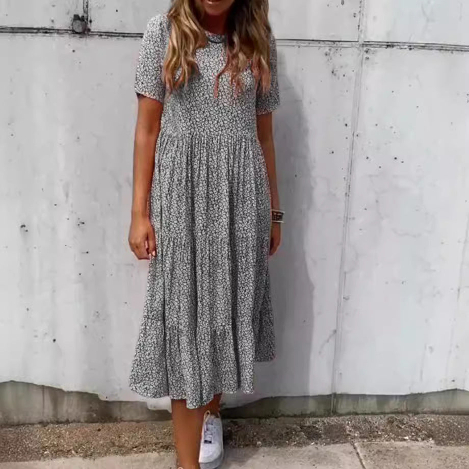 Damen nan geblümtes gekrepptes Midikleid mit geraffter Empire-Taille, kurzen Ärmeln und stufigem Volantrock Drune