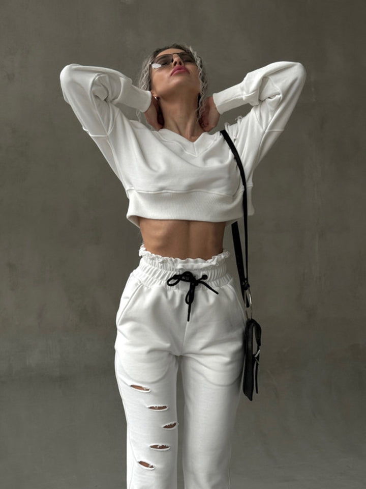 Damen kurzgeschnittenes Sweat-Set mit V-Ausschnitt, Rüschenbund Highwaist Jogginghose und Distressed-Details Drune