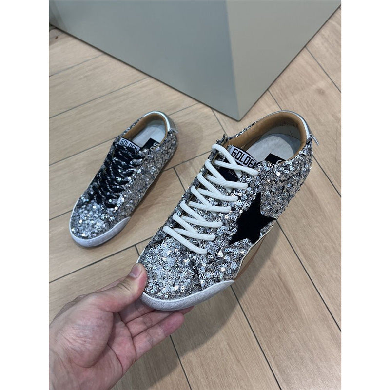 Damen Glitzer-Sneaker mit Paillettenbesatz, Stern-Applikation und kontrastierenden Schnürsenkeln Drune
