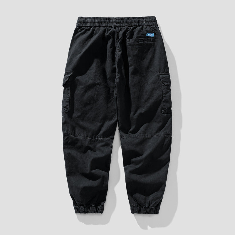 Herren Leichte Canvas-Cargohose im Joggerstil mit elastischem Bund, segmentierten Kniepaneelen und verdeckten Klappentaschen Drune